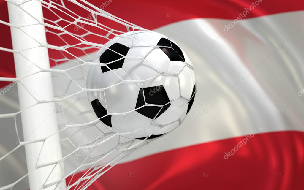 Austria waving flag and soccer ball in goal net