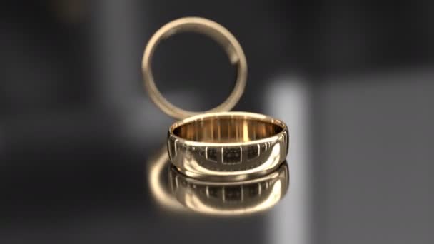 Anillos de boda sobre fondo brillante — Vídeo de stock