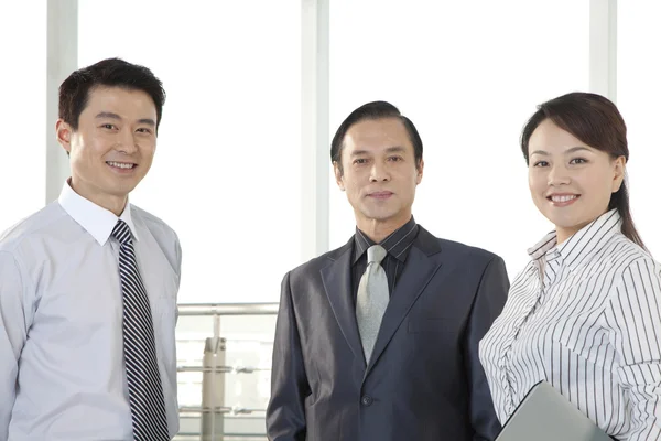 Three Businesspeople Looking at Camera — Stock Photo, Image