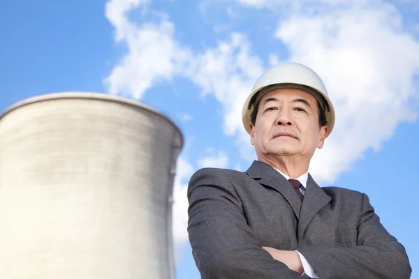 Businessman at power plant — Stock Photo, Image
