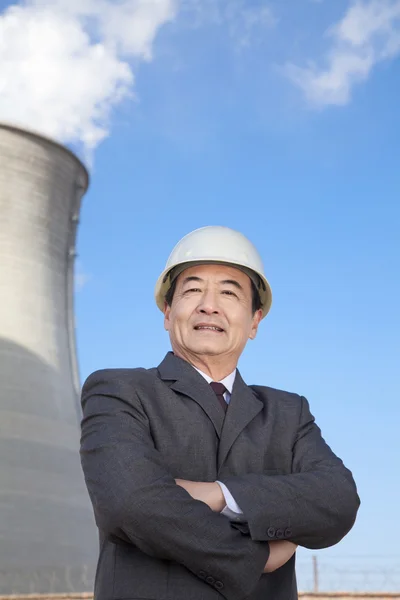 Businessman at power plant — Stock Photo, Image