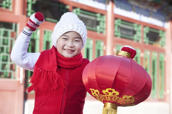 Young boy holding red lantern — Stock Photo, Image