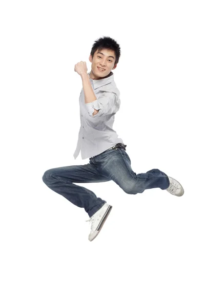 Portrait of a young man mid-air — Stock Photo, Image