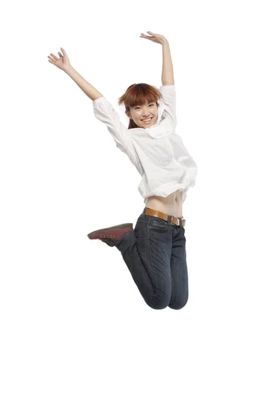 Portrait of a young man mid-air — Stock Photo, Image