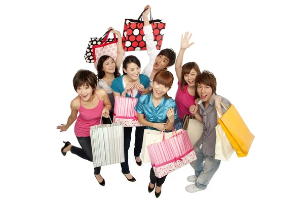 Młodzi ludzie podekscytowany zakupy — Zdjęcie stockowe