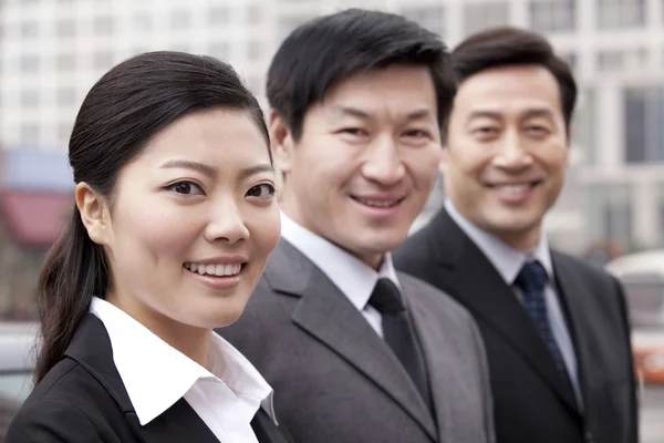 Three businesspeople outdoors — Stock Photo, Image