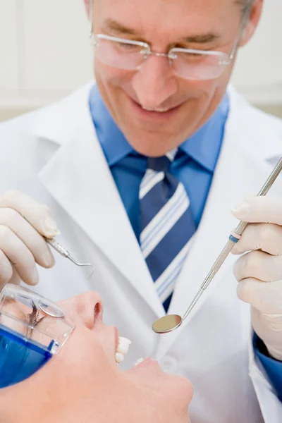 Friendly male dentist and patient — Stock Photo, Image