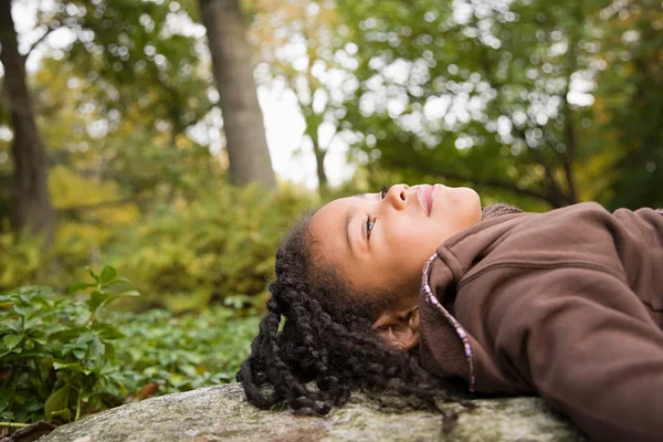 Portrait of a girl in a forest — Stock Photo, Image