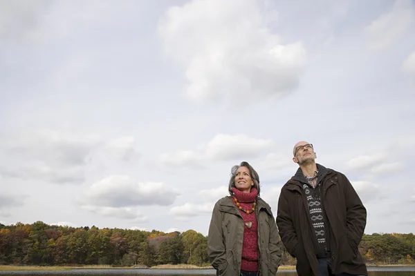 Mature couple near a forest — Stock Photo, Image