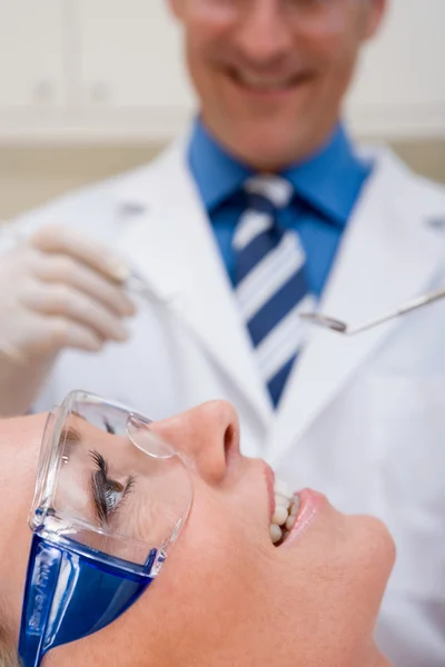 Dentist and a patient — Stock Photo, Image