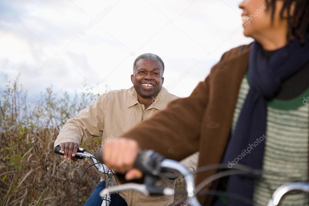 African couple cycling