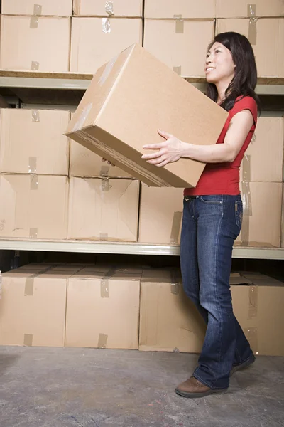 Woman with cardboard boxes — Stock Photo, Image