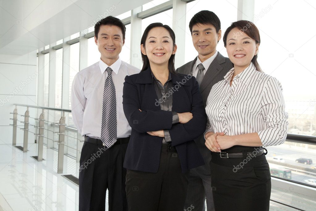 Business Team Looking At Camera