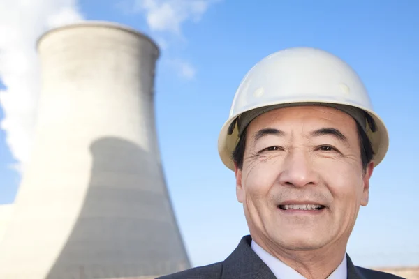 Businessman at power plant — Stock Photo, Image