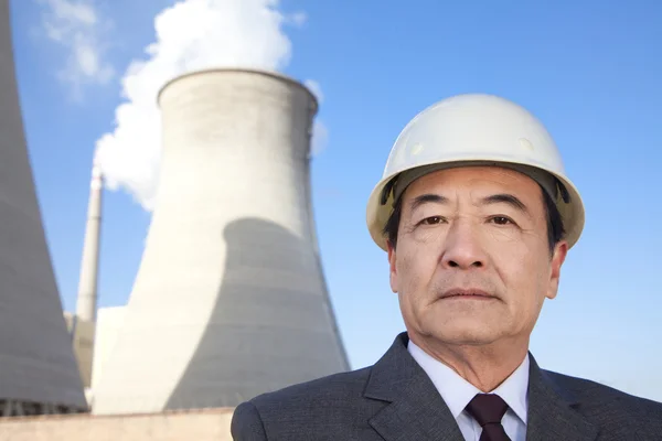 Businessman at power plant — Stock Photo, Image