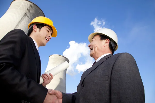 Businessmen at power plant — Stock Photo, Image