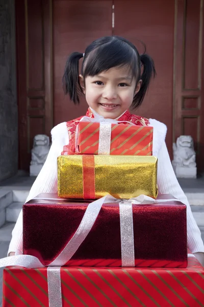 Girl Holding Gifts — Stock Photo, Image