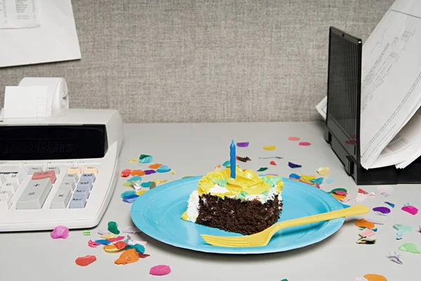 Birthday cake on an office desk — Stock Photo, Image