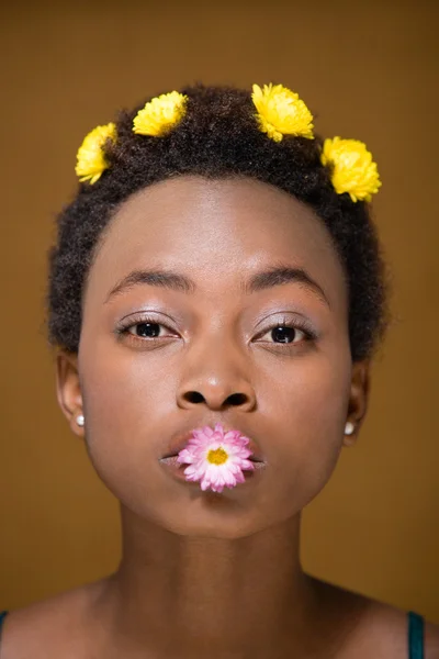 Portrait of a woman with flowers — Stock Photo, Image