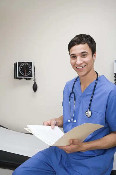 Doctor with medical records — Stock Photo, Image