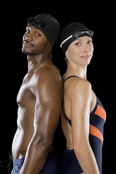 Two swimmers stand back to back — Stock Photo, Image