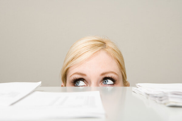 Woman behind filing cabinet