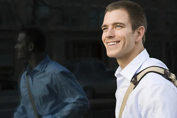 Young brunette man smiling — Stock Photo, Image