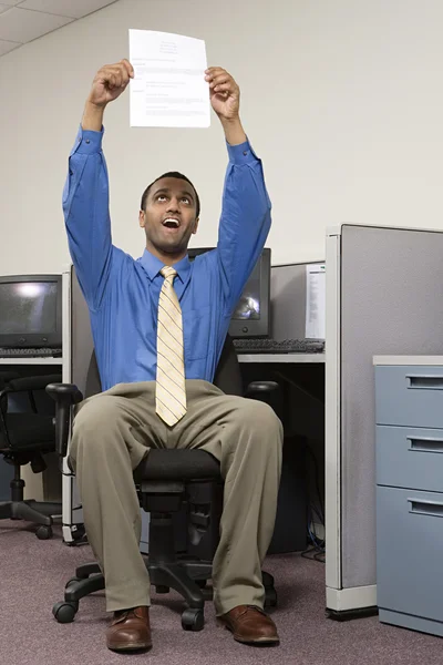 Man holding up his resume — Stock Photo, Image