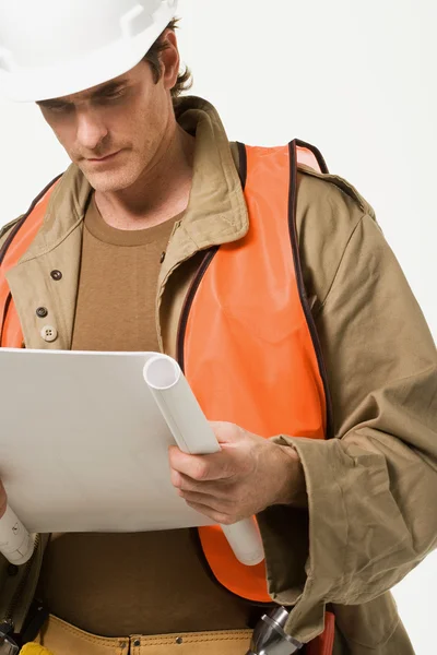 Construction worker with plan — Stock Photo, Image