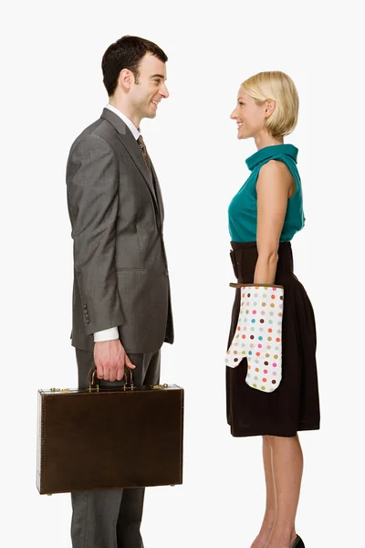 Businessman and wife smiling — Stock Photo, Image