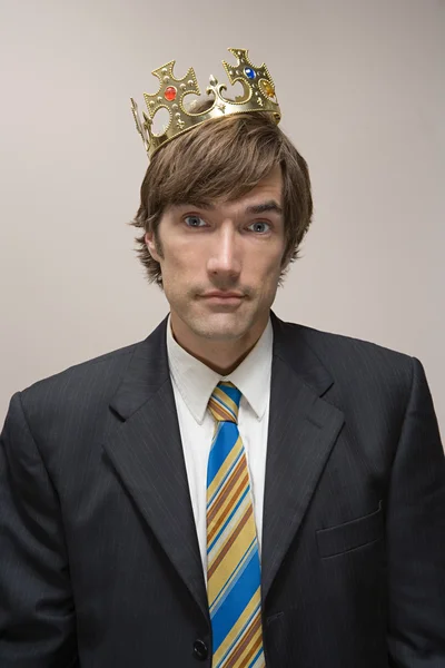 Man wearing a crown Stock Picture