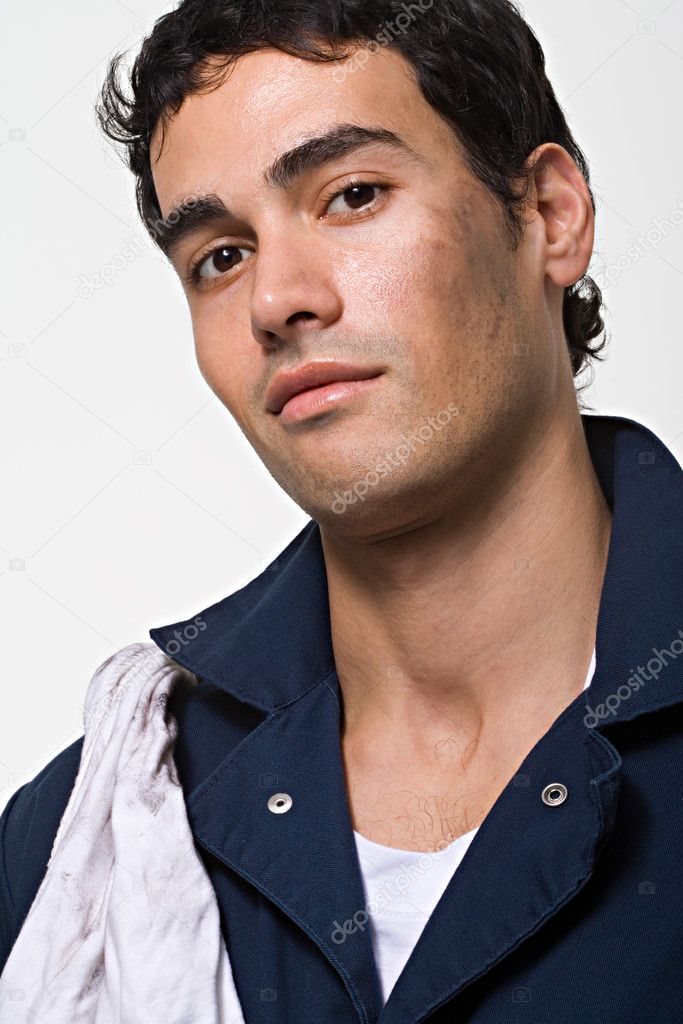 Portrait of a young caucasian mechanic