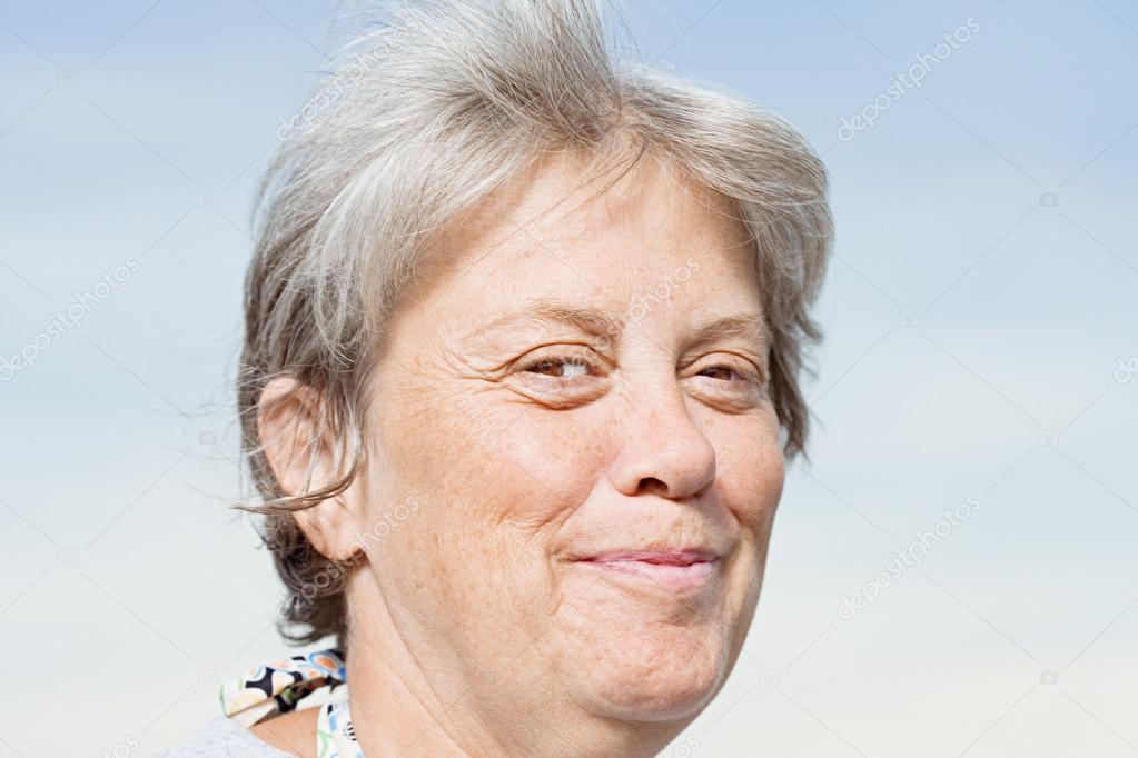 Old woman smirking