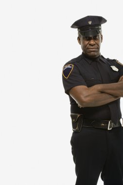 Portrait of a serious police officer clipart