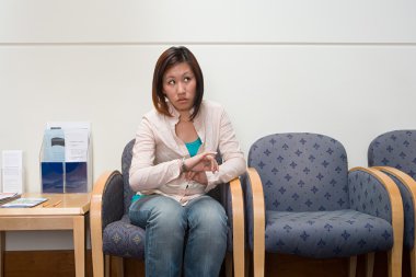 Woman in hospital waiting room clipart