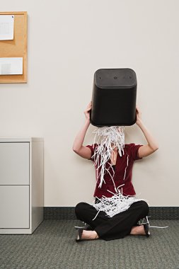 Woman tipping shredded paper over herself clipart