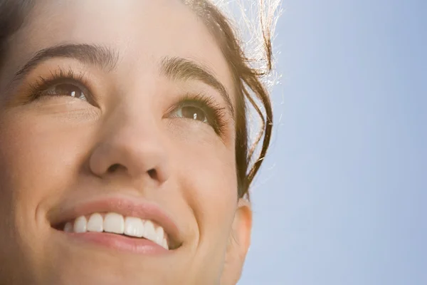 Face of a woman in sunlight — Stock Photo, Image