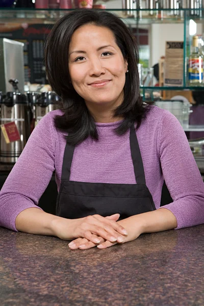 Waiter smiling at camera — Stock Photo, Image