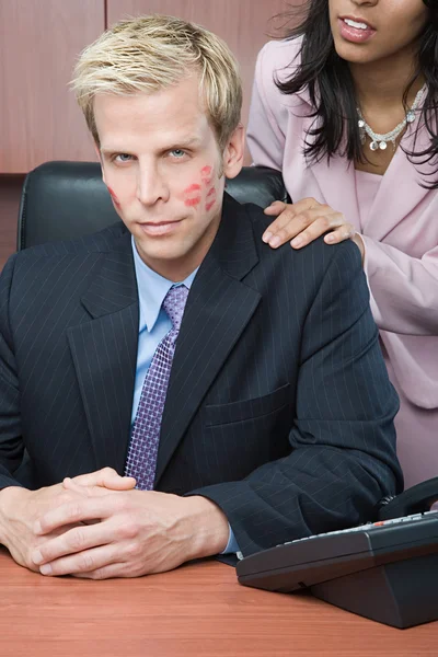 Businesswoman flirting with businessman — Stock Photo, Image