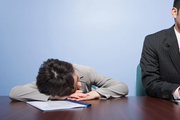 Businesswoman sleeping on table — Stock Photo, Image