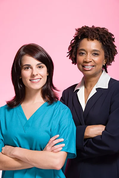 A female nurse and businesswoman — Stock Photo, Image