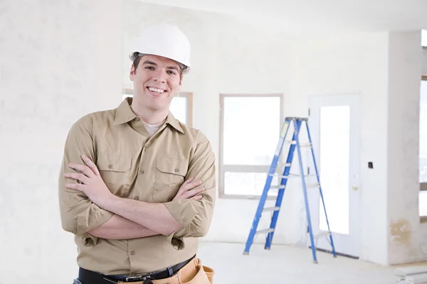 Smiling builder in helmet — Stock Photo, Image