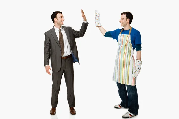 Businessman and house husband — Stock Photo, Image