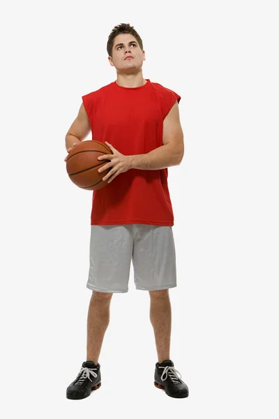 Basketball player holding ball — Stock Photo, Image