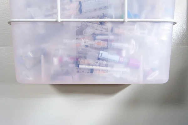 Syringe bin in hospital — Stock Photo, Image