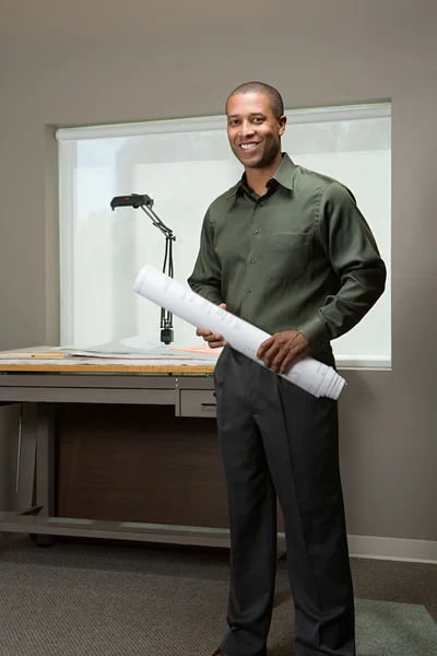 Architect smiling at camera — Stock Photo, Image