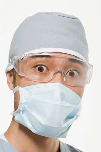 Portrait of a suprised asian surgeon — Stock Photo, Image