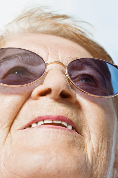 Senior woman looking up — Stock Photo, Image