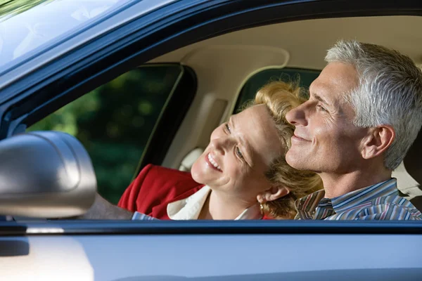 Mature couple in a car — Stock Photo, Image