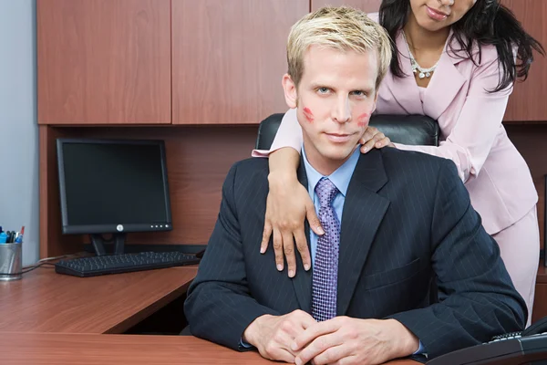 Businesswoman flirting with businessman — Stock Photo, Image